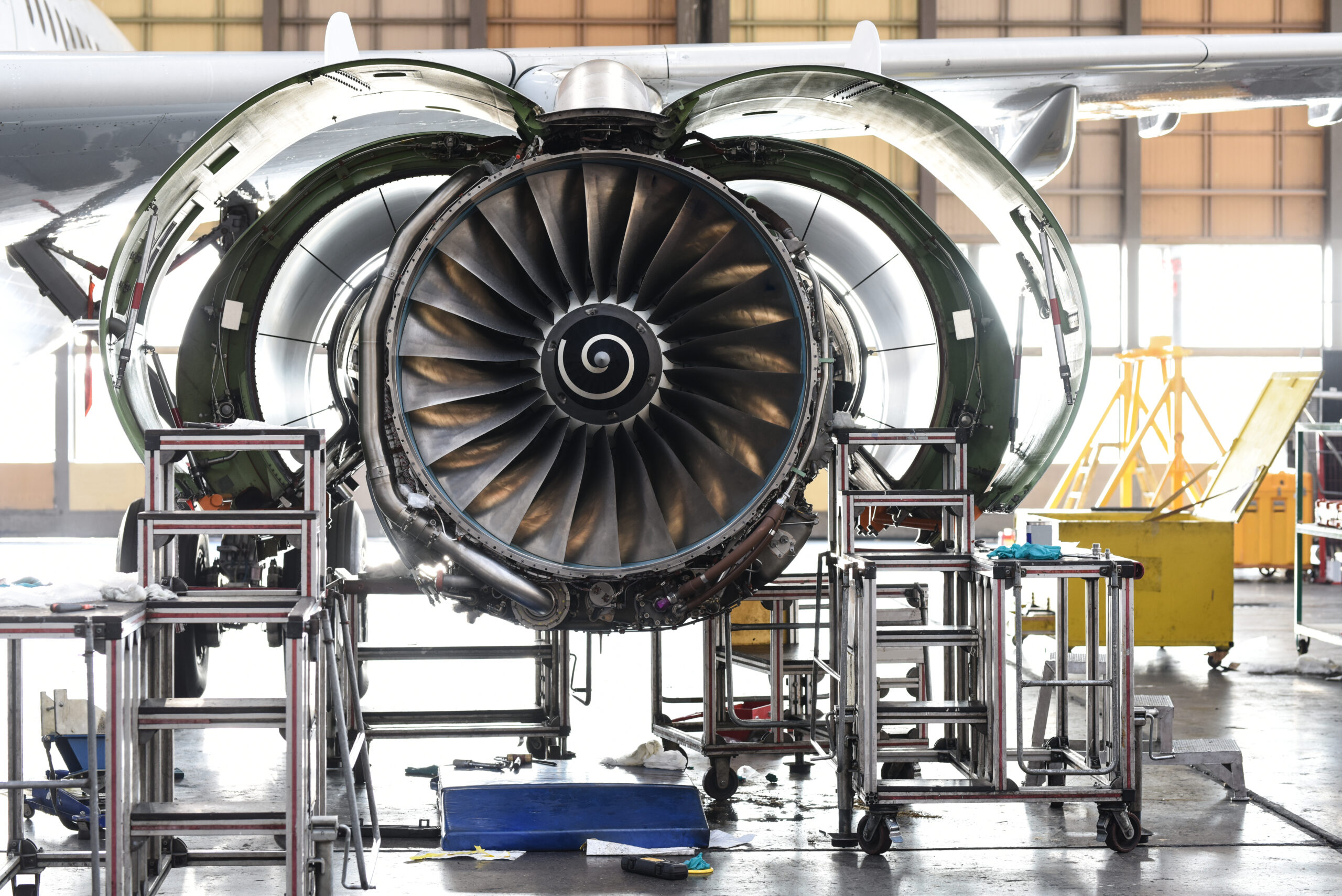 Aircraft engine undergoing maintenance in MRO facility